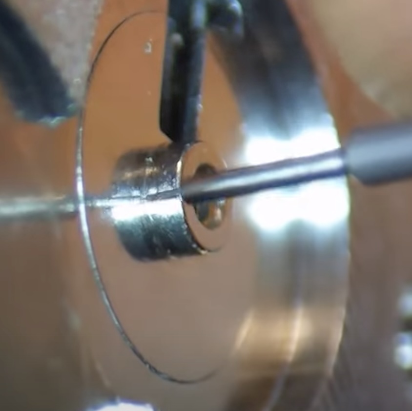 Axe roue de rochet et cliquet